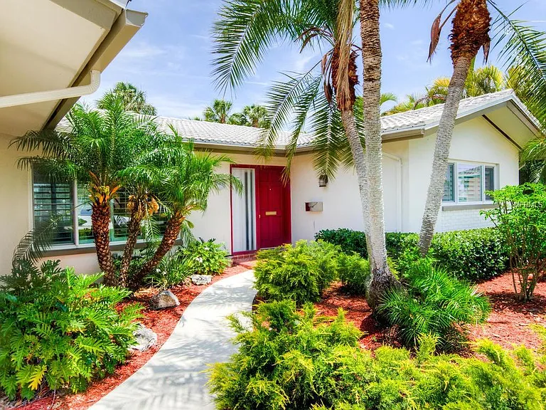 Front entry walkway with red door